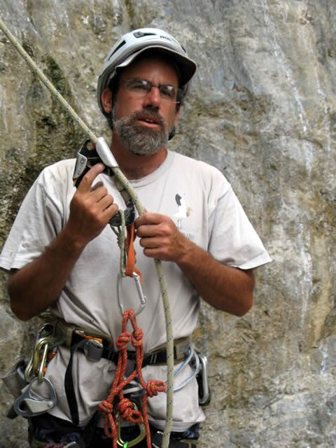 Todd Vogel describes equipment to volunteer climbers